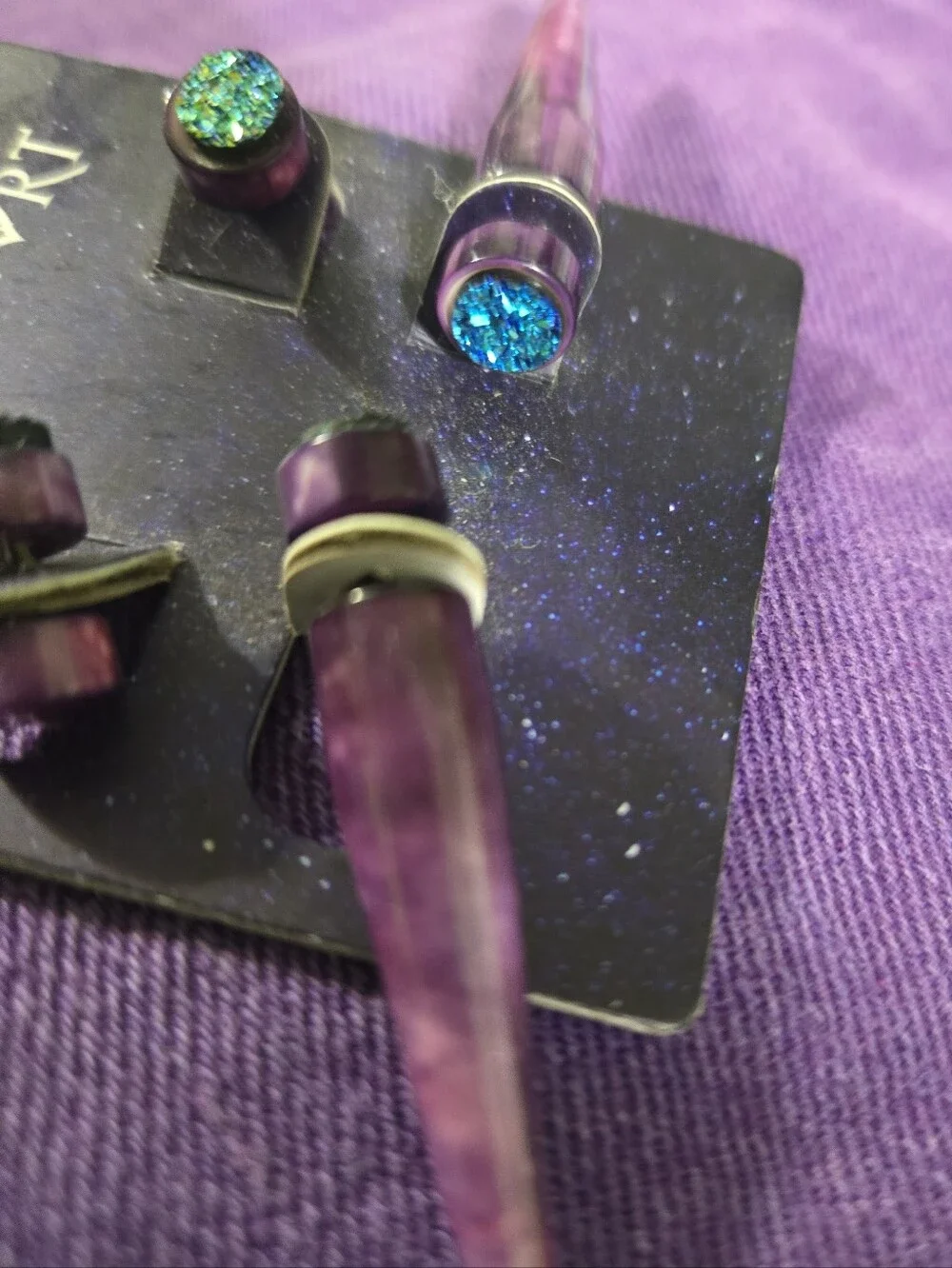 2 Sets Of Blackheart Purple Spike & Glitter Stud Faux Taperd (Never Worn)